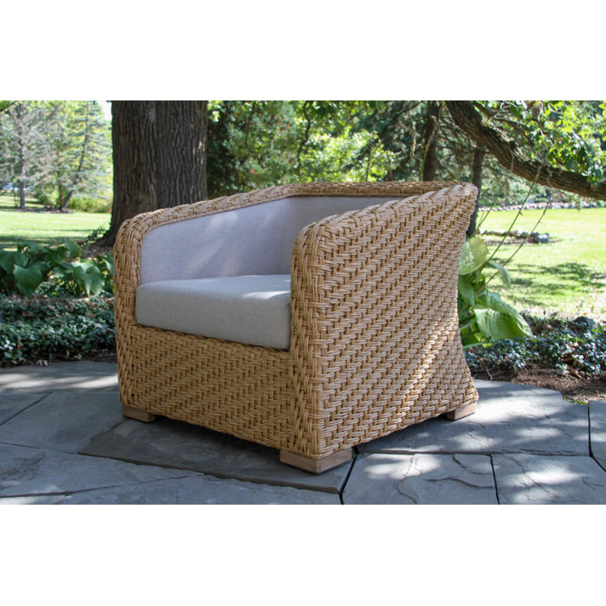 Edicott Wicker Outdoor Lounge Chair - Image 1
