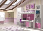 Children's bedroom with a fixed bed-table and a lower folding bed with a table.