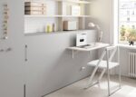 Horizontal folding bed with desk from the UD series, with corner wardrobe and stacked bookcase