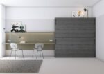 Children's bedroom with folding bunk beds and double study area