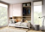 Horizontal folding bed with integrated table and sliding wardrobe
