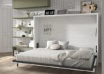 Bedroom with a horizontal folding double bed and study area - Image 3