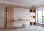 Bedroom with folding bunk bed with table