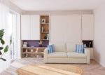Living room with a folding double bed and sofa