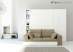 Living room with fold-down bed and sofa + wardrobe