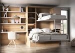 Vertical folding bunk bed with integrated sofa and a workspace