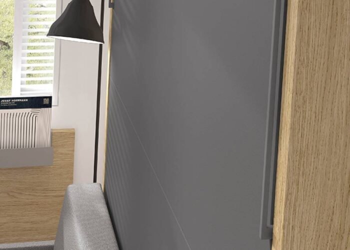 Bedroom with vertical folding bed and sofa. - Image 2