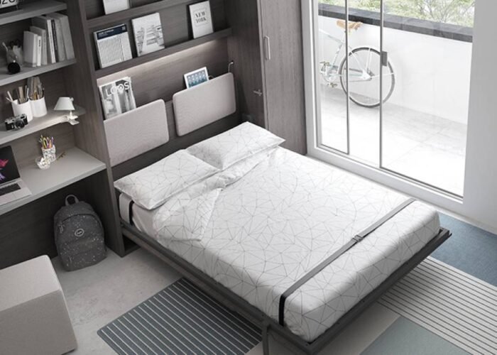 Bedroom with a vertical folding double bed and study area. - Image 2