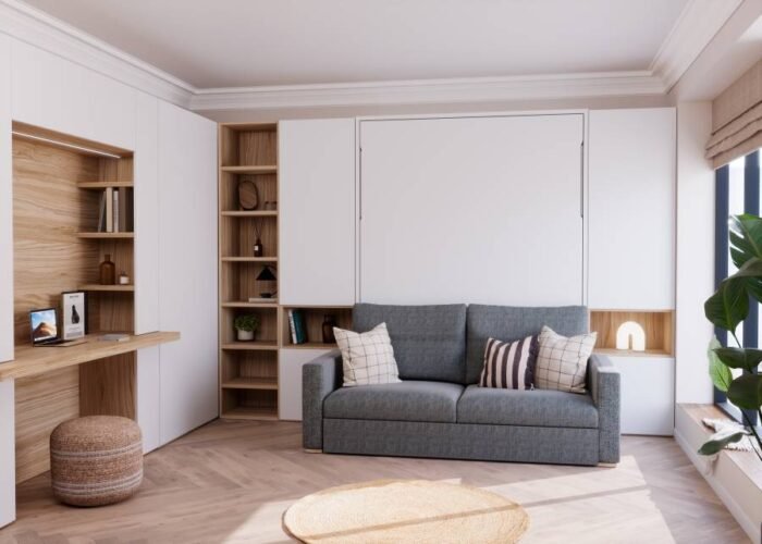 Living room with fold-down bed, sofa and desk - Image 1