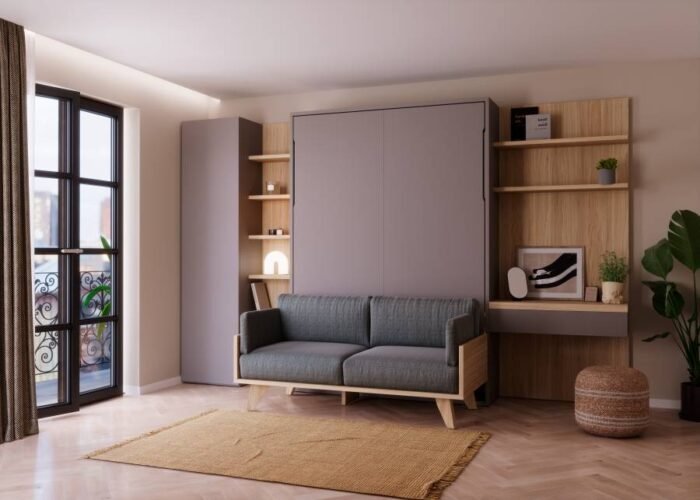 Living room with fold-down bed, sofa and desk - Image 1