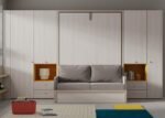 Vertical folding bed with sofa and side cabinets.